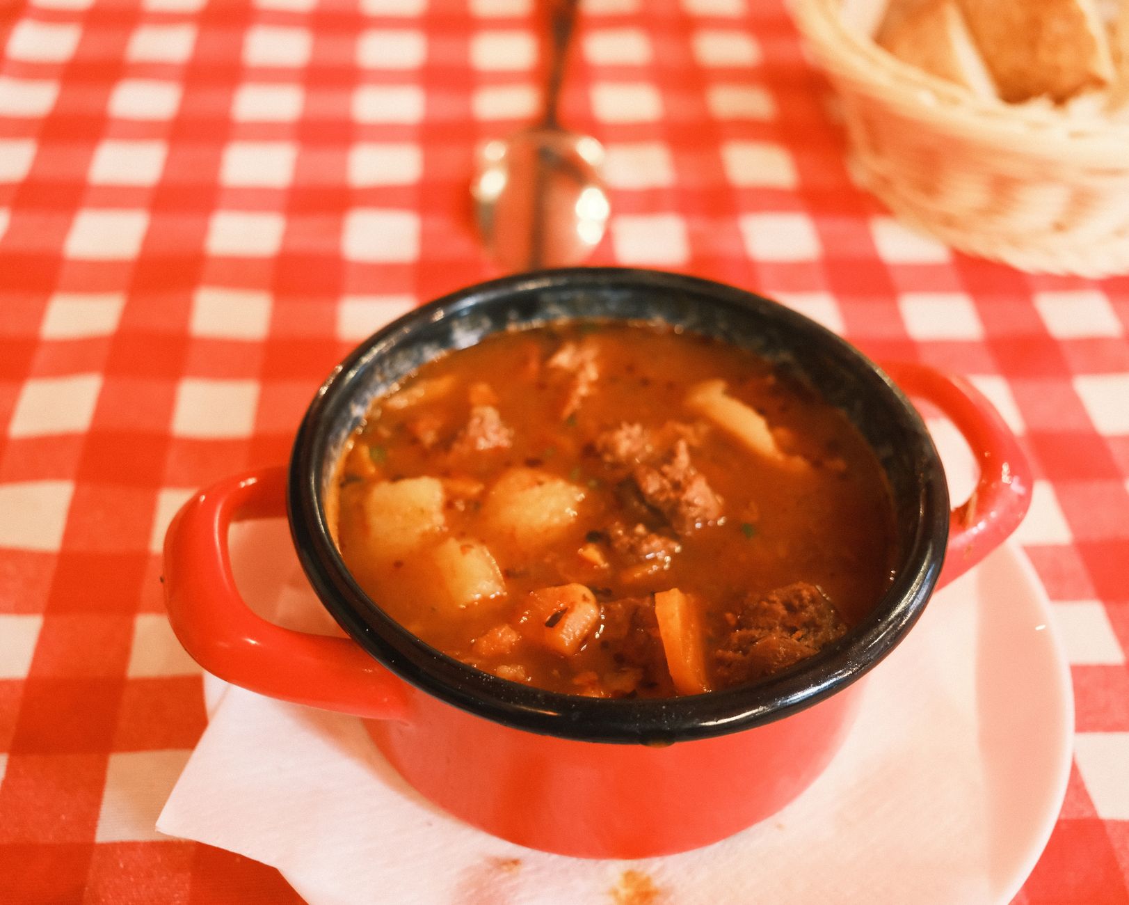 A pot of beef stew with vegetables