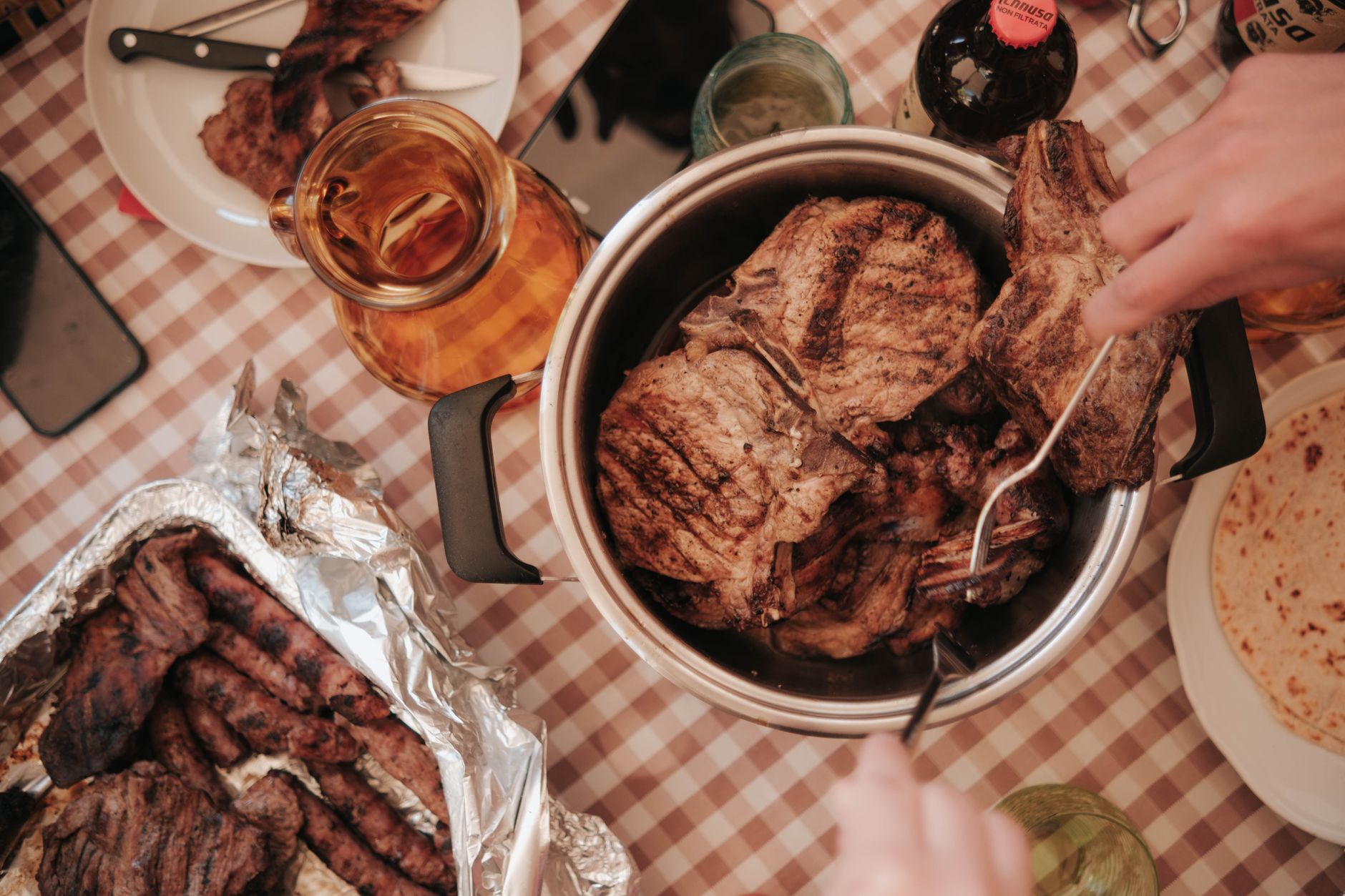 Grilled meat served at a table