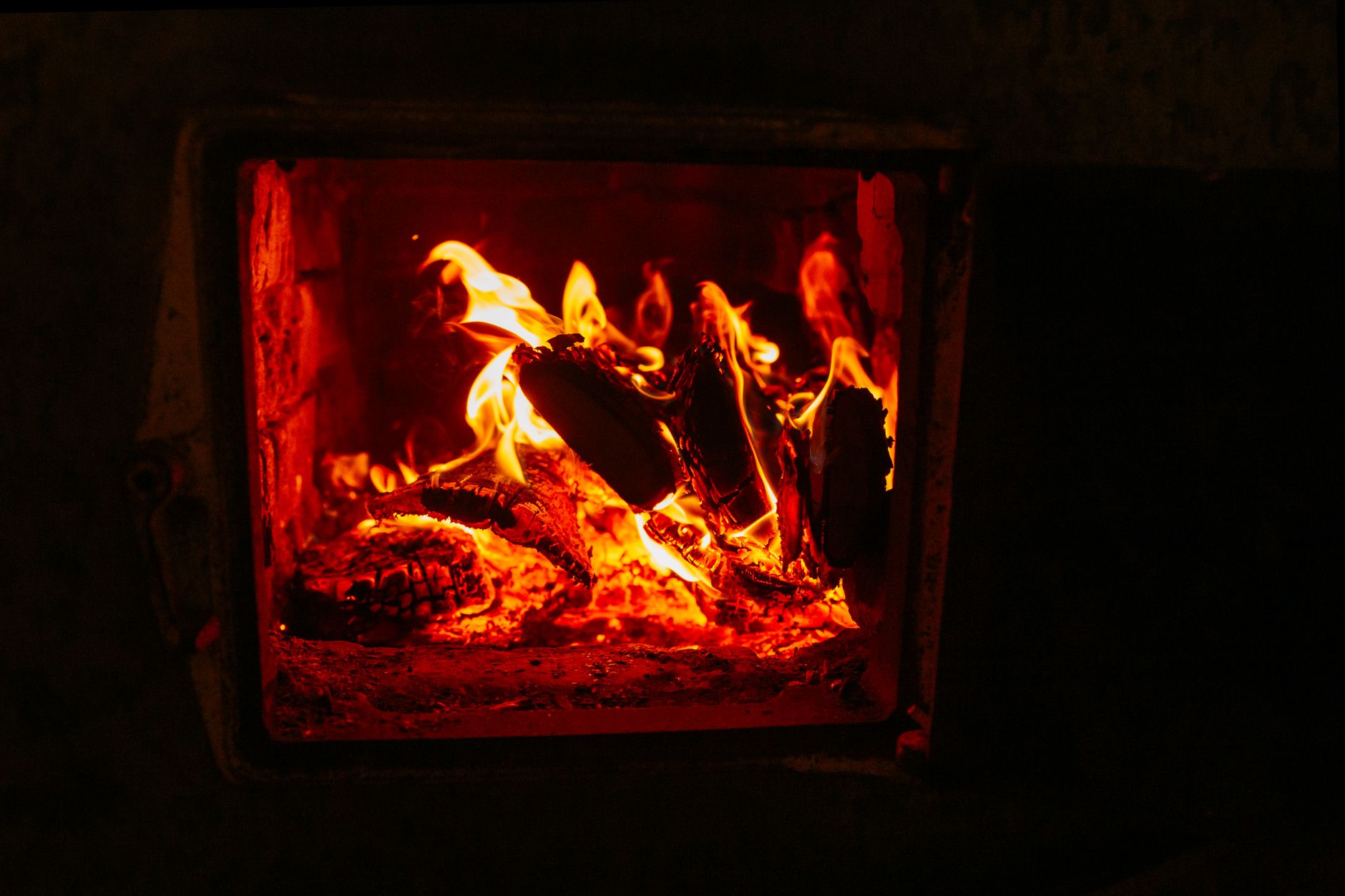 A fire burning in a wood stove