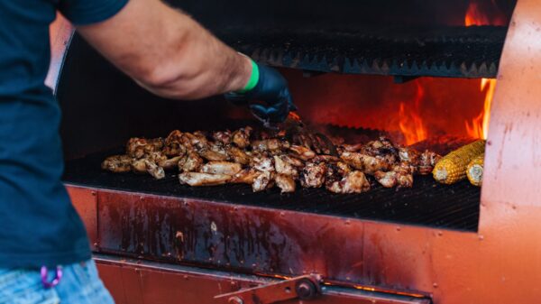 Best smoker grill: chicken cooking in an offset smoker