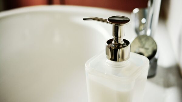 Best soap dispenser: a pump dispenser beside a bathroom sink