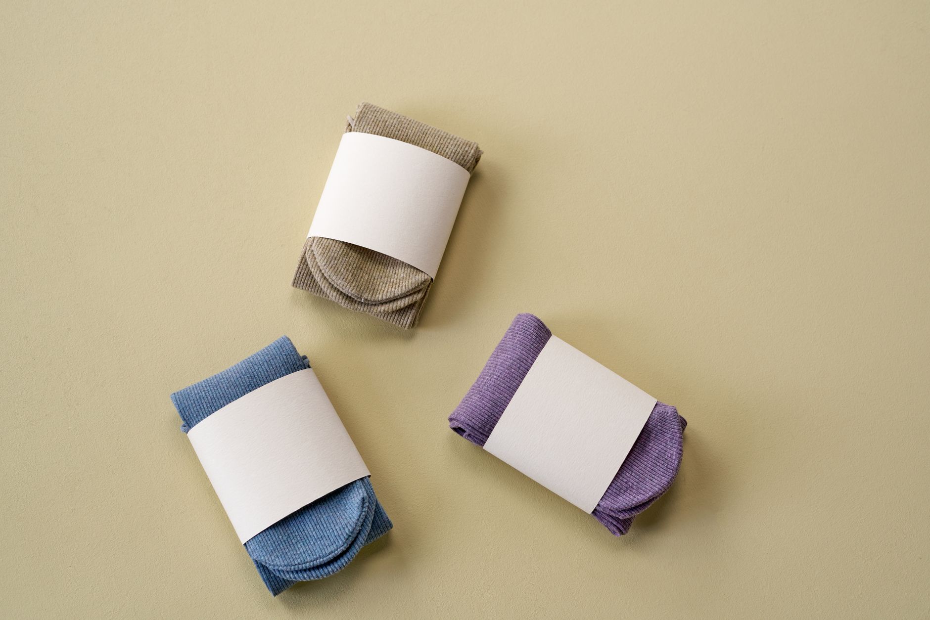 Folded socks with paper bands