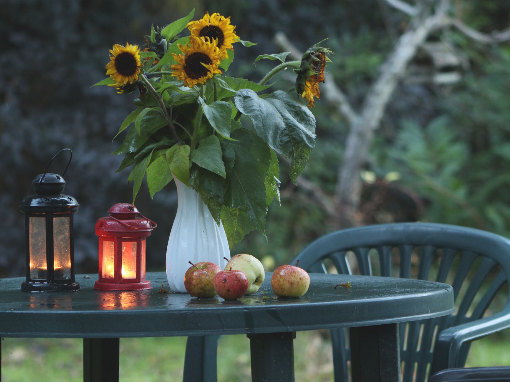 A lantern on an outdoor table