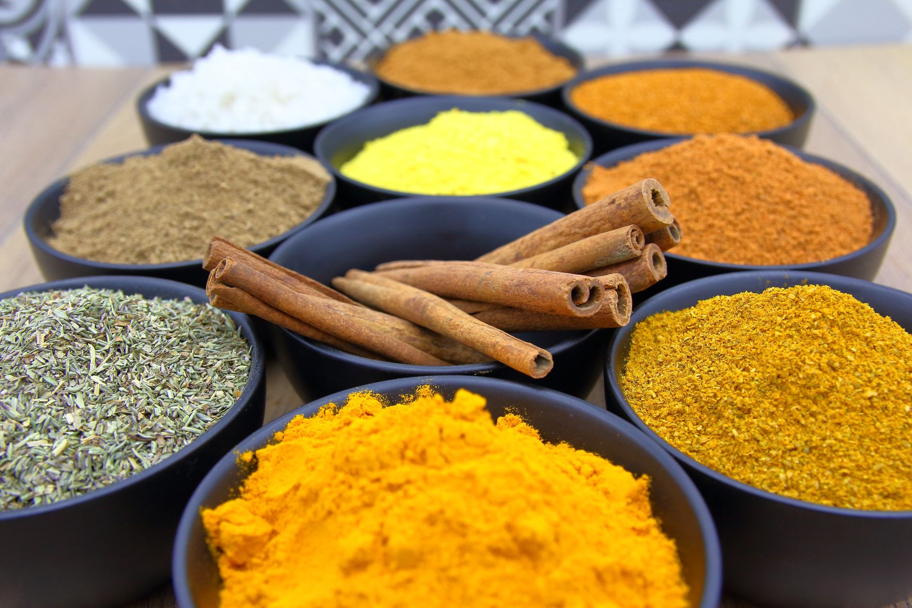 Small bowls of colorful spices