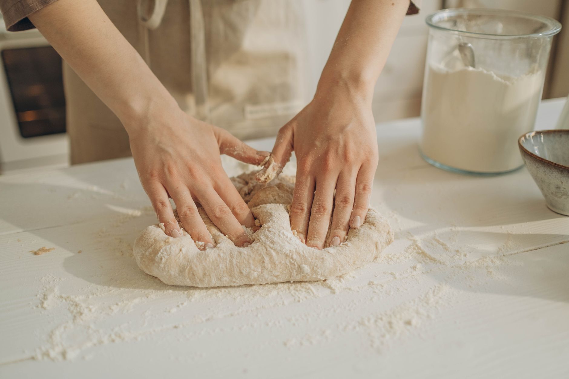 Bread dough being kneaded