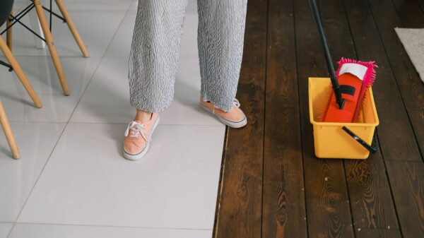 Best steam mop: a mop and bucket on a tiled floor
