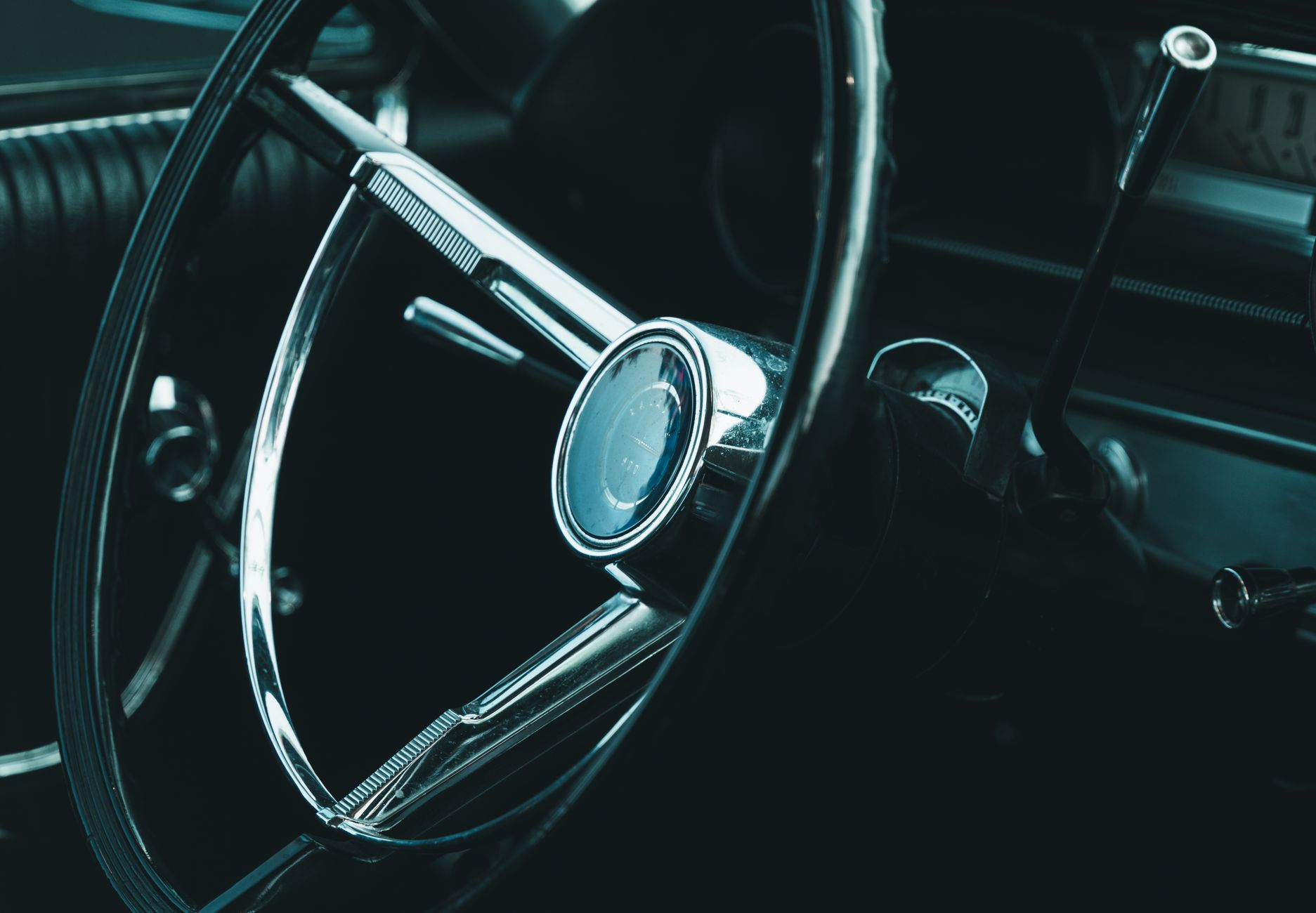 Best steering wheel cover: a car steering wheel seen from the driver seat