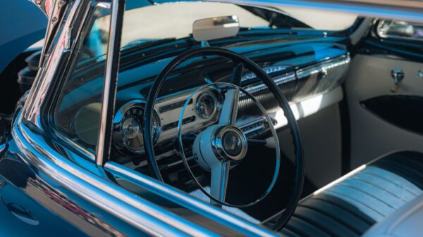 The steering wheel and dashboard of a classic car