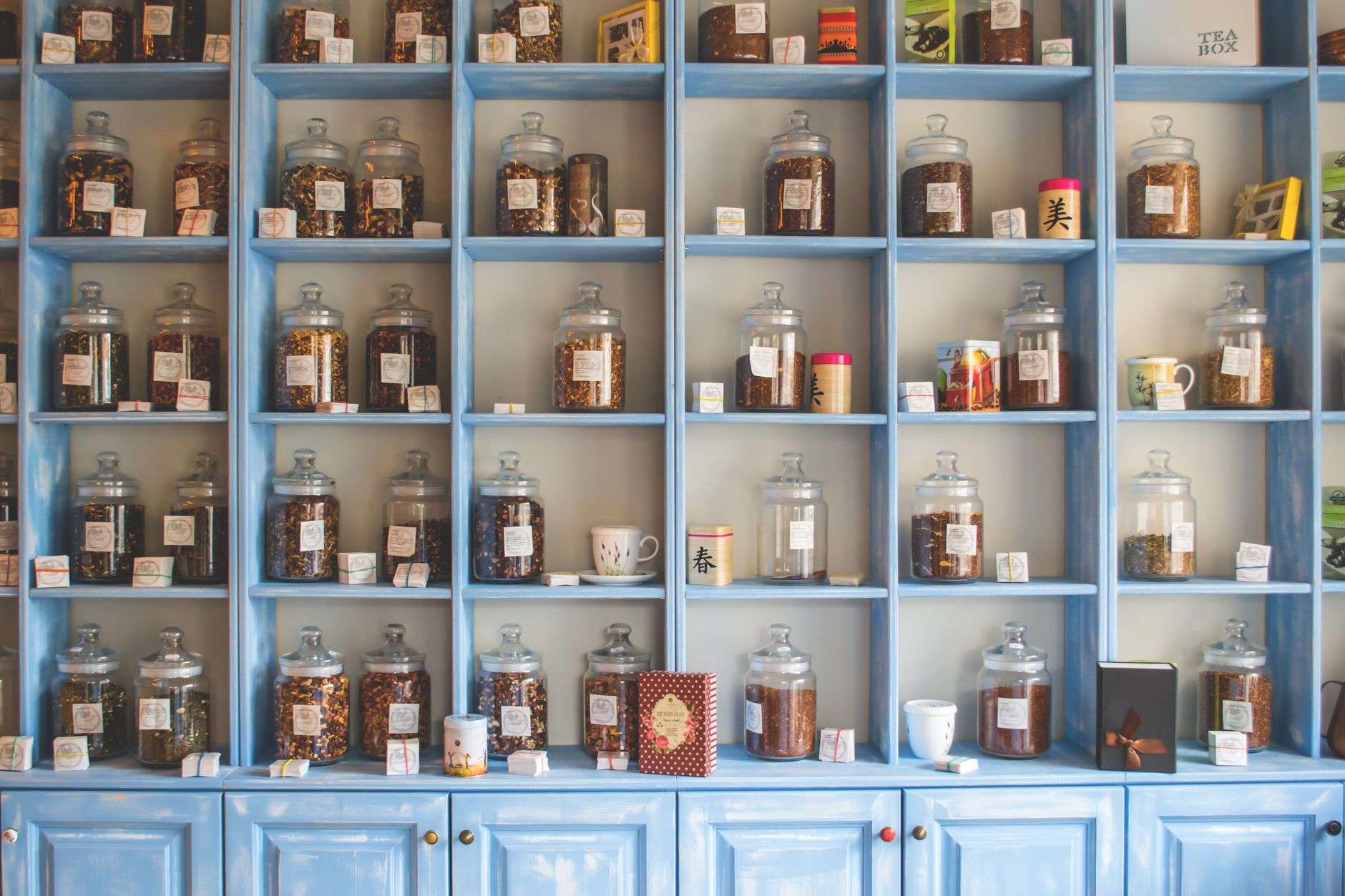 Tall shelves lined with glass jars