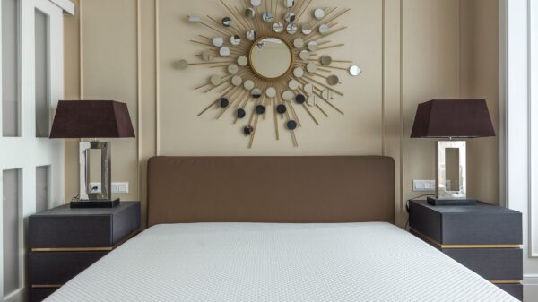 Best table lamp: a lamp glowing on a bedroom nightstand