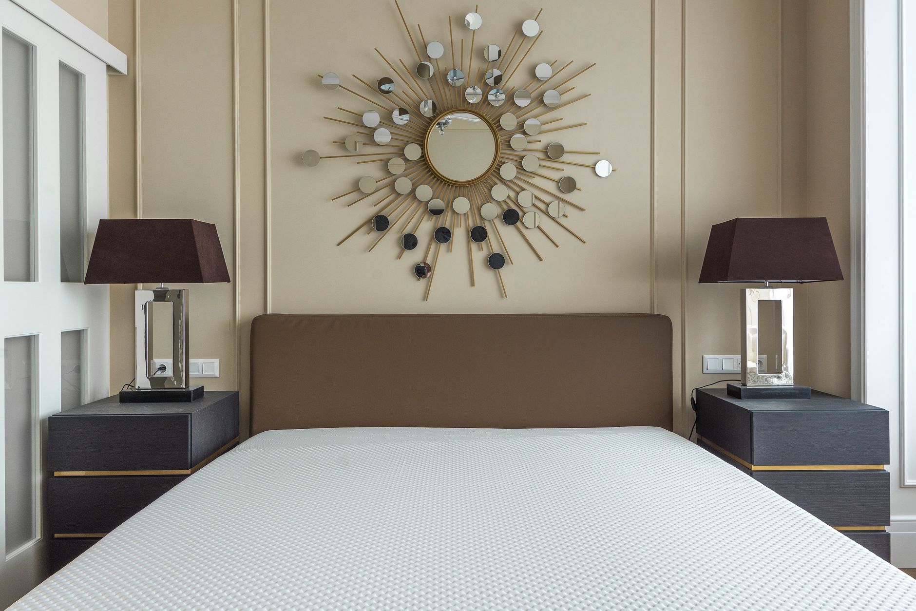 Best table lamp: a lamp glowing on a bedroom nightstand