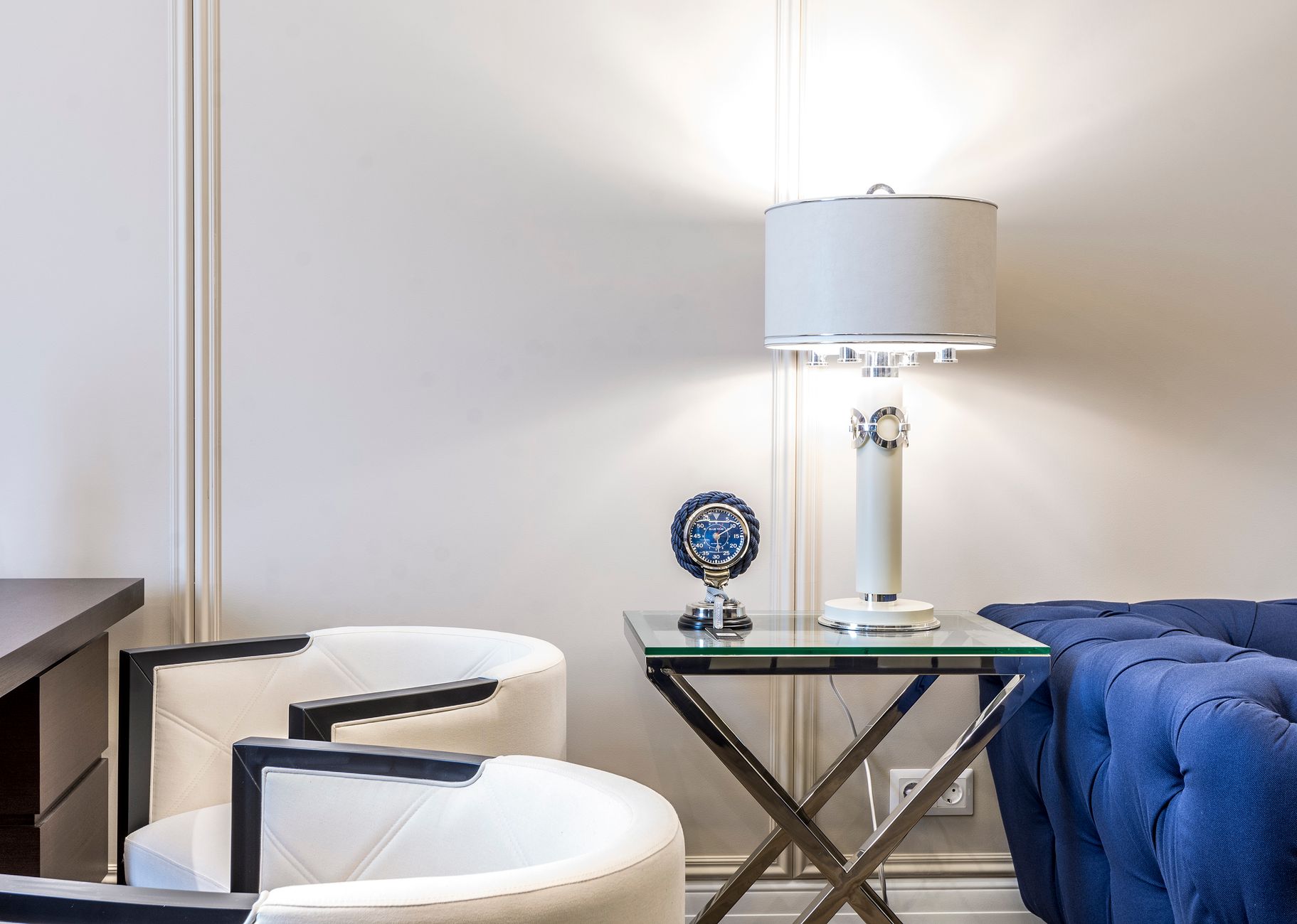 A table lamp on an end table in a living room