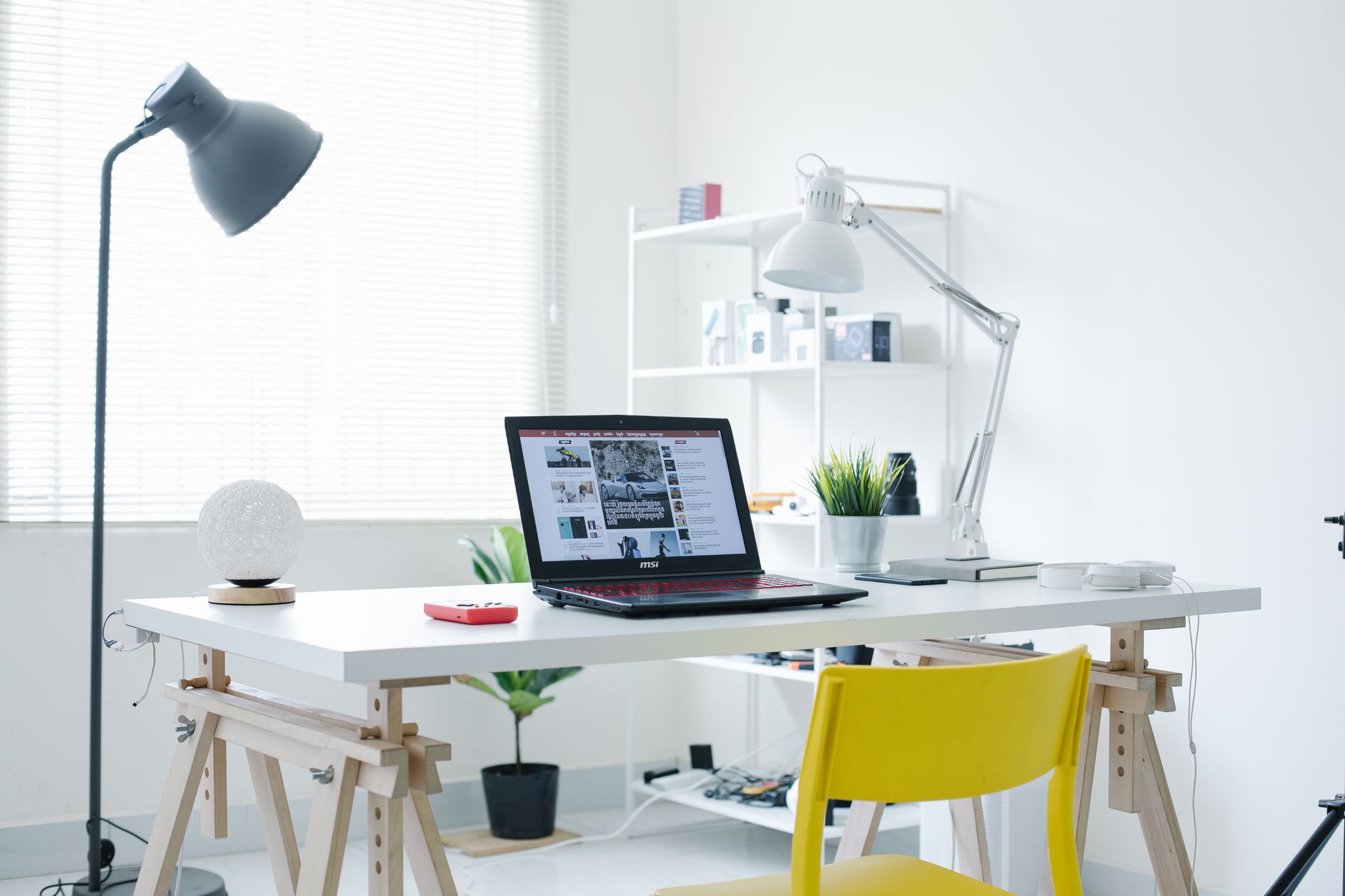 A lamp on a desk in a home office
