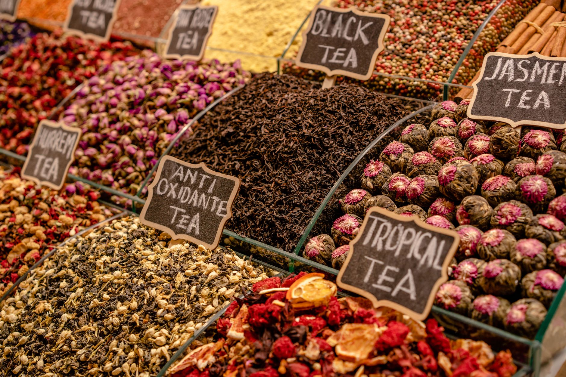 Bins of loose leaf tea at a market