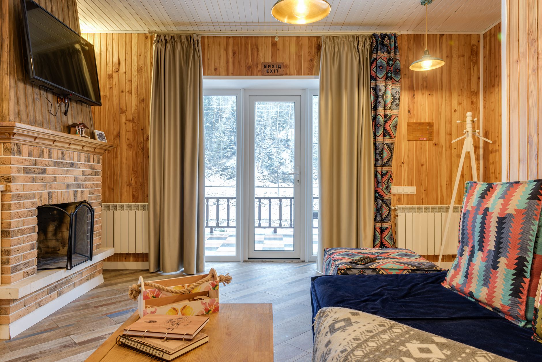 Best thermal curtains: heavy curtains in a living room in winter