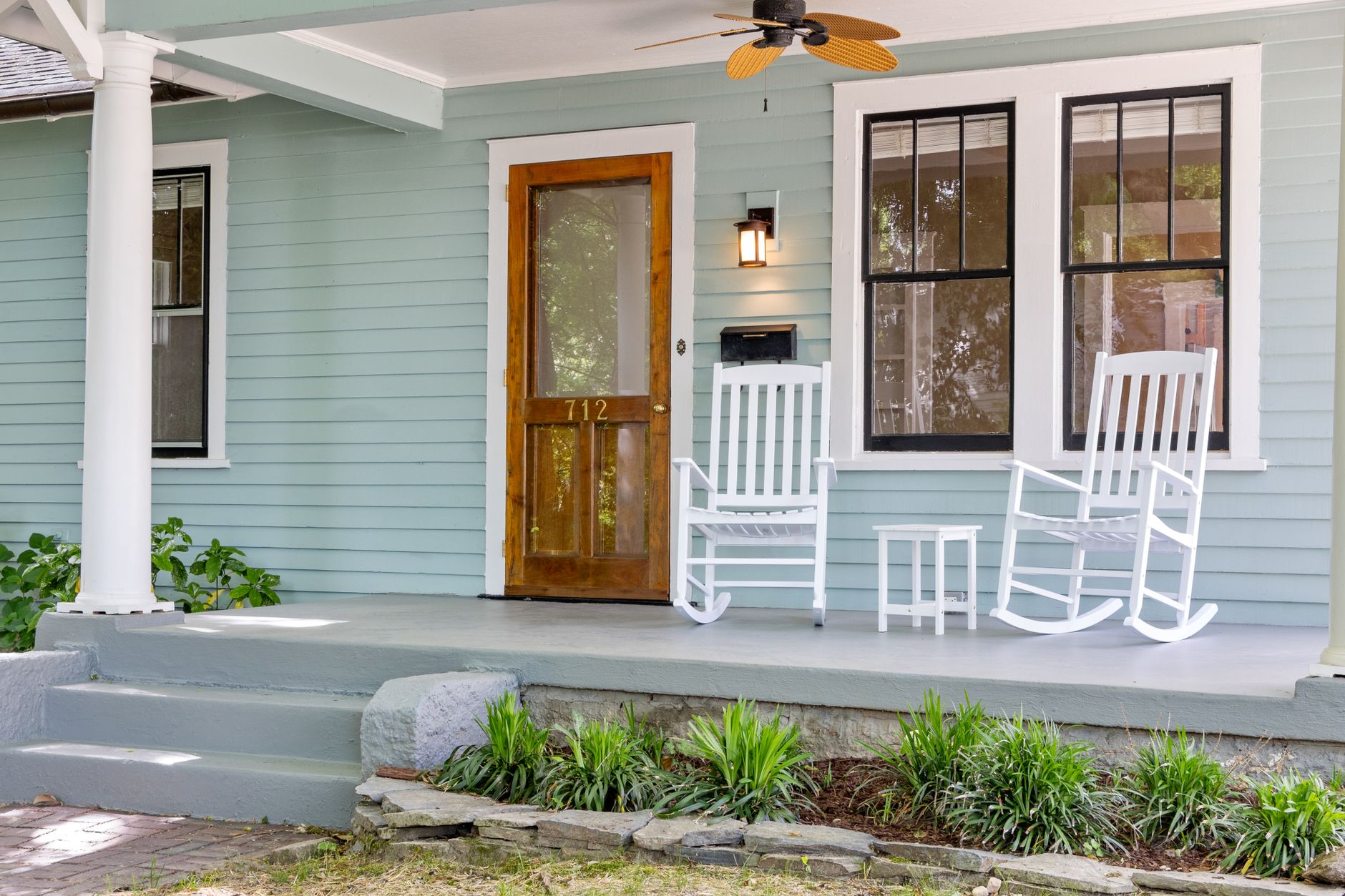 Front porch steps leading to a house door
