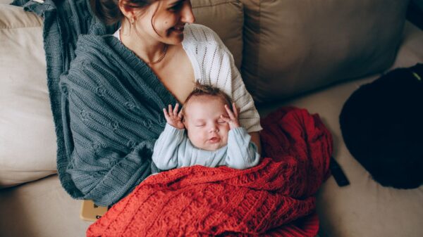Best throw blanket: a soft blanket draped over a living room couch