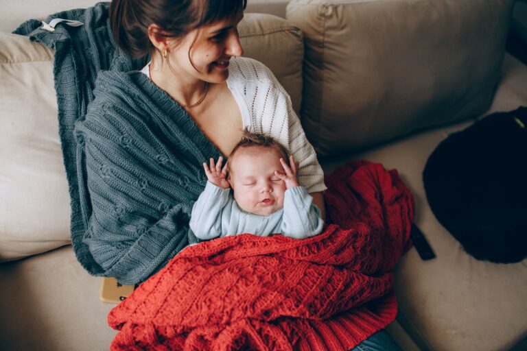 Best throw blanket: a soft blanket draped over a living room couch