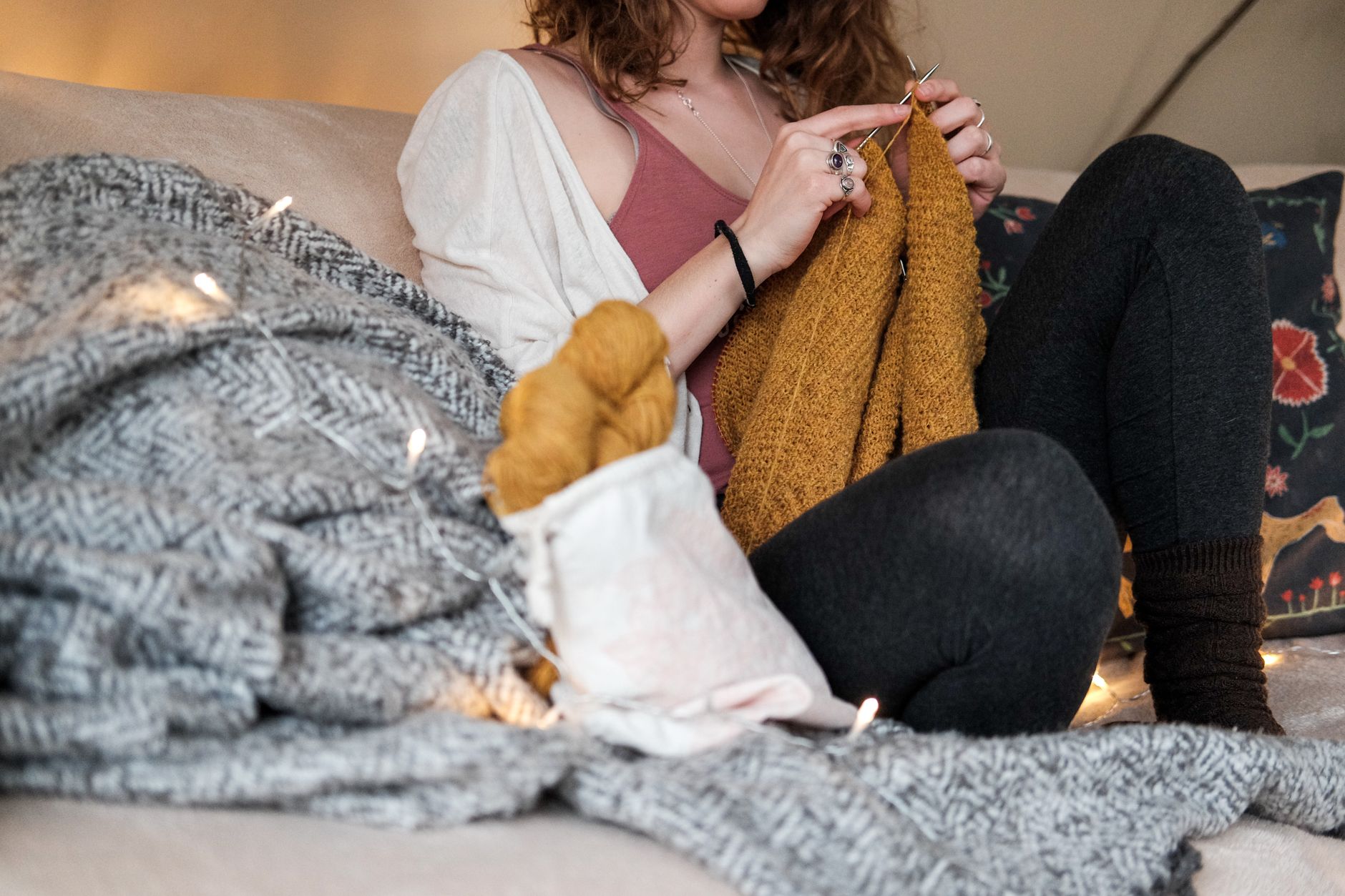 A knitted blanket on a sofa