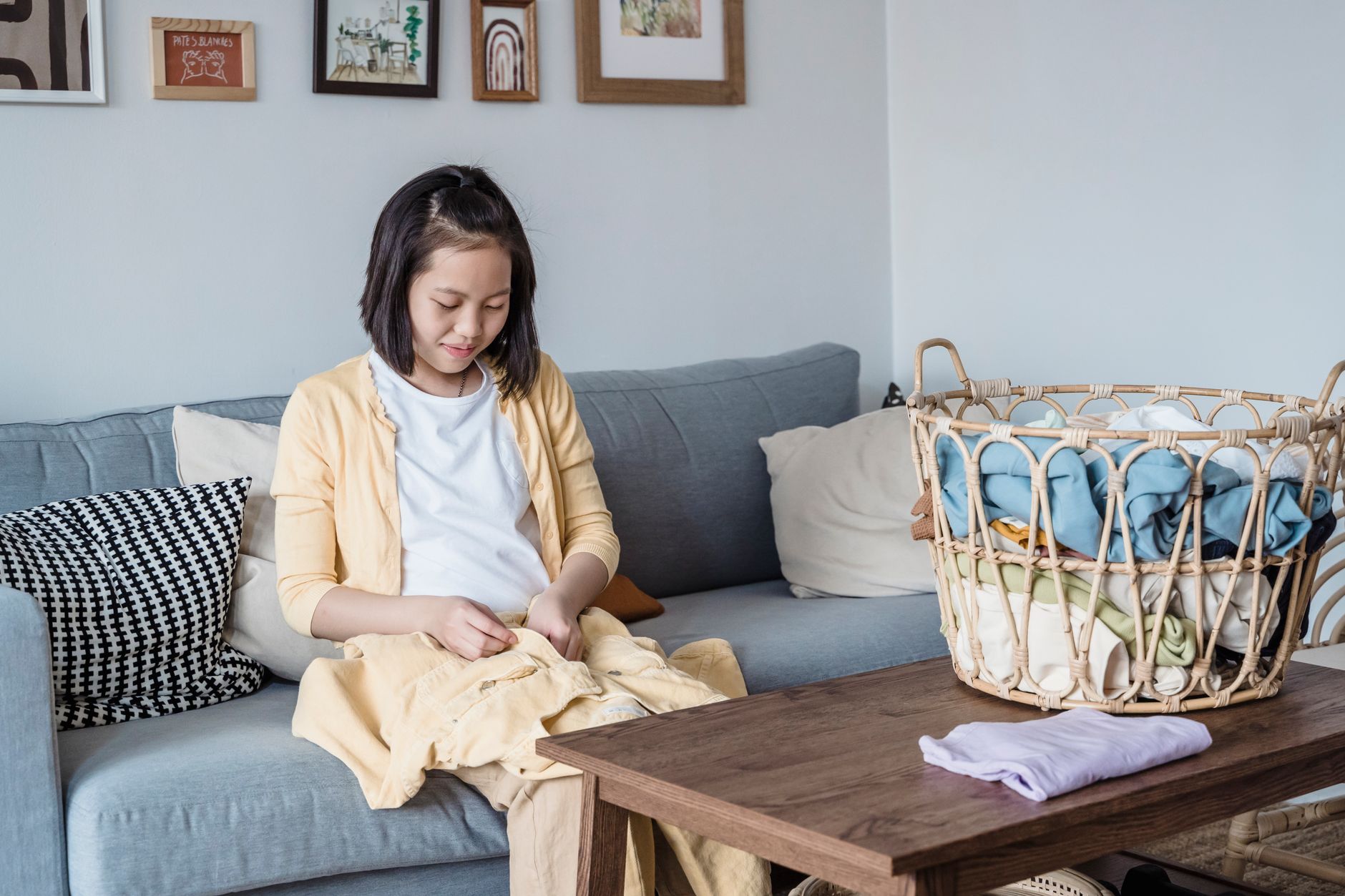 Washed throw blankets folded in a basket