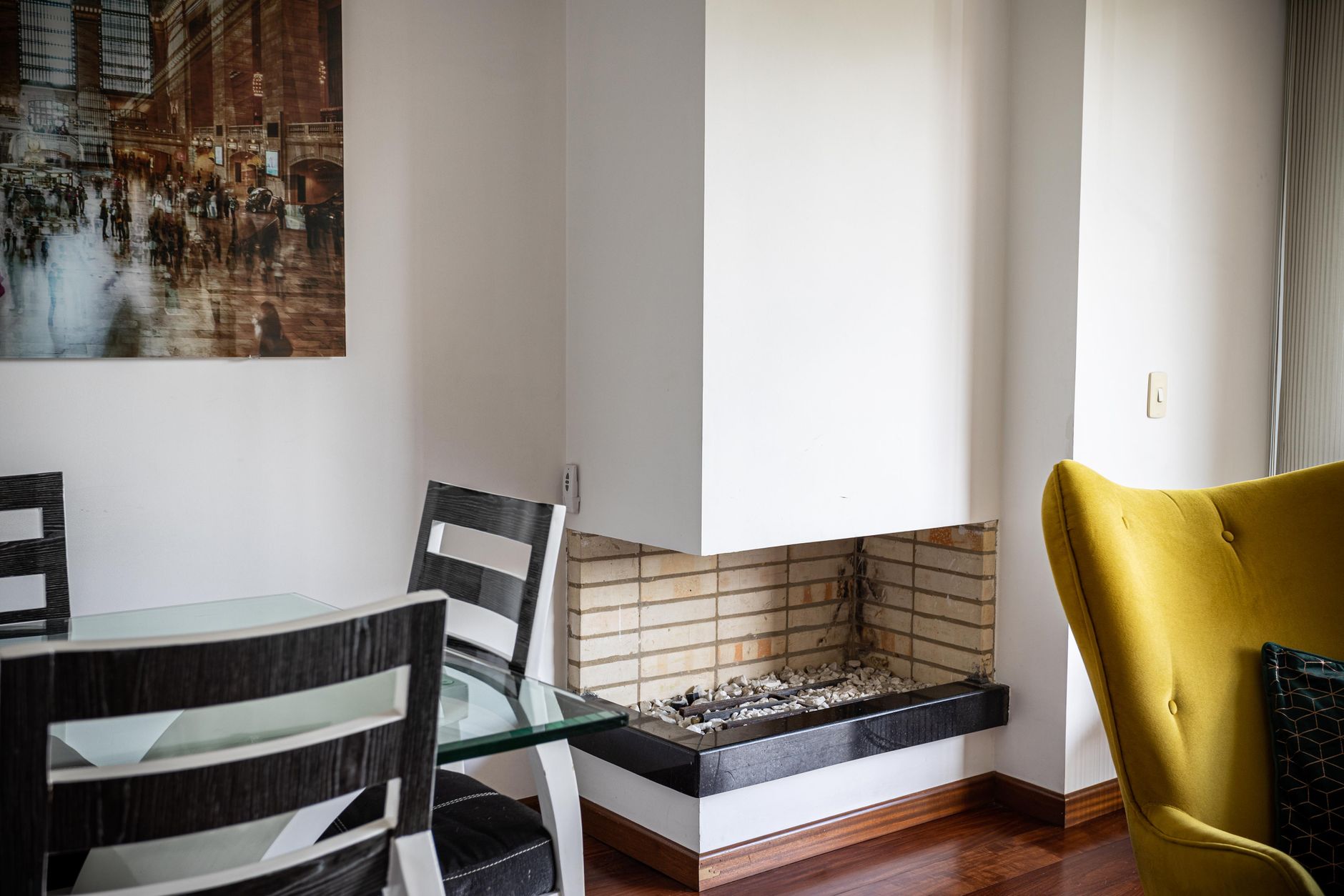 A living room with a fireplace