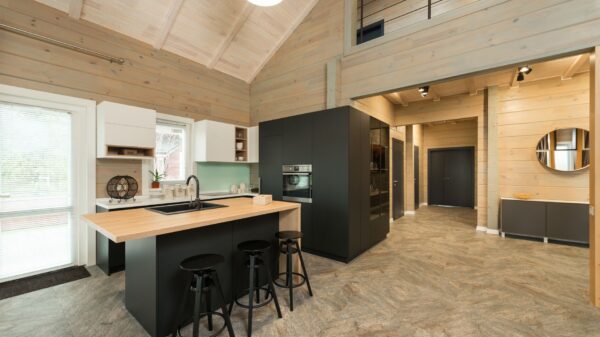 Best toddler tower: a wooden stool beside a kitchen counter