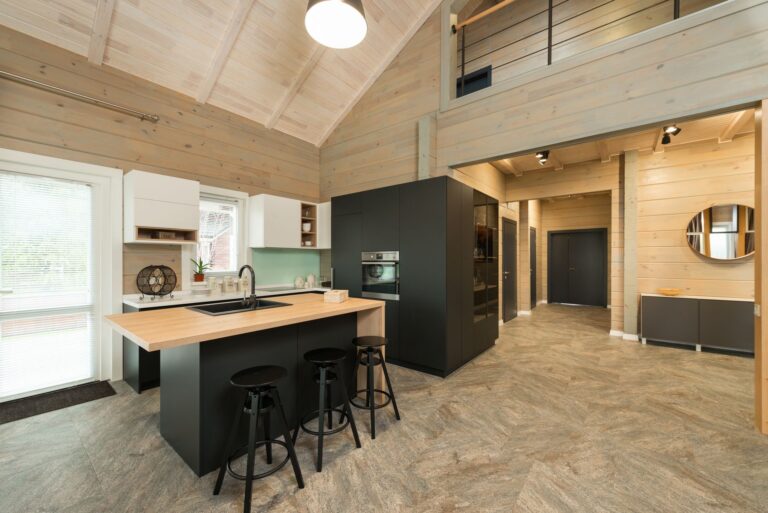 Best toddler tower: a wooden stool beside a kitchen counter