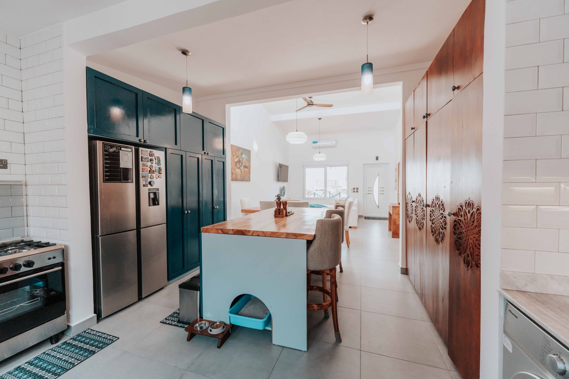 A kitchen island with counter-height work space