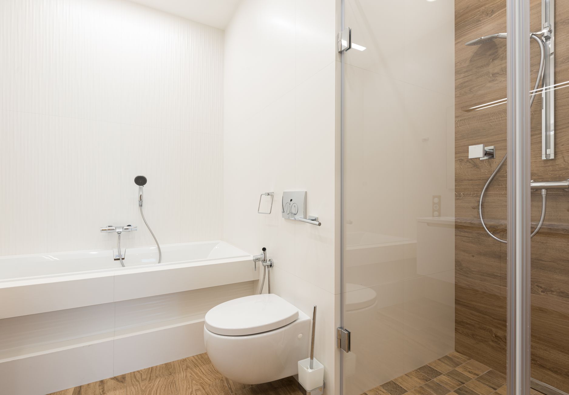 A white toilet in a clean bathroom