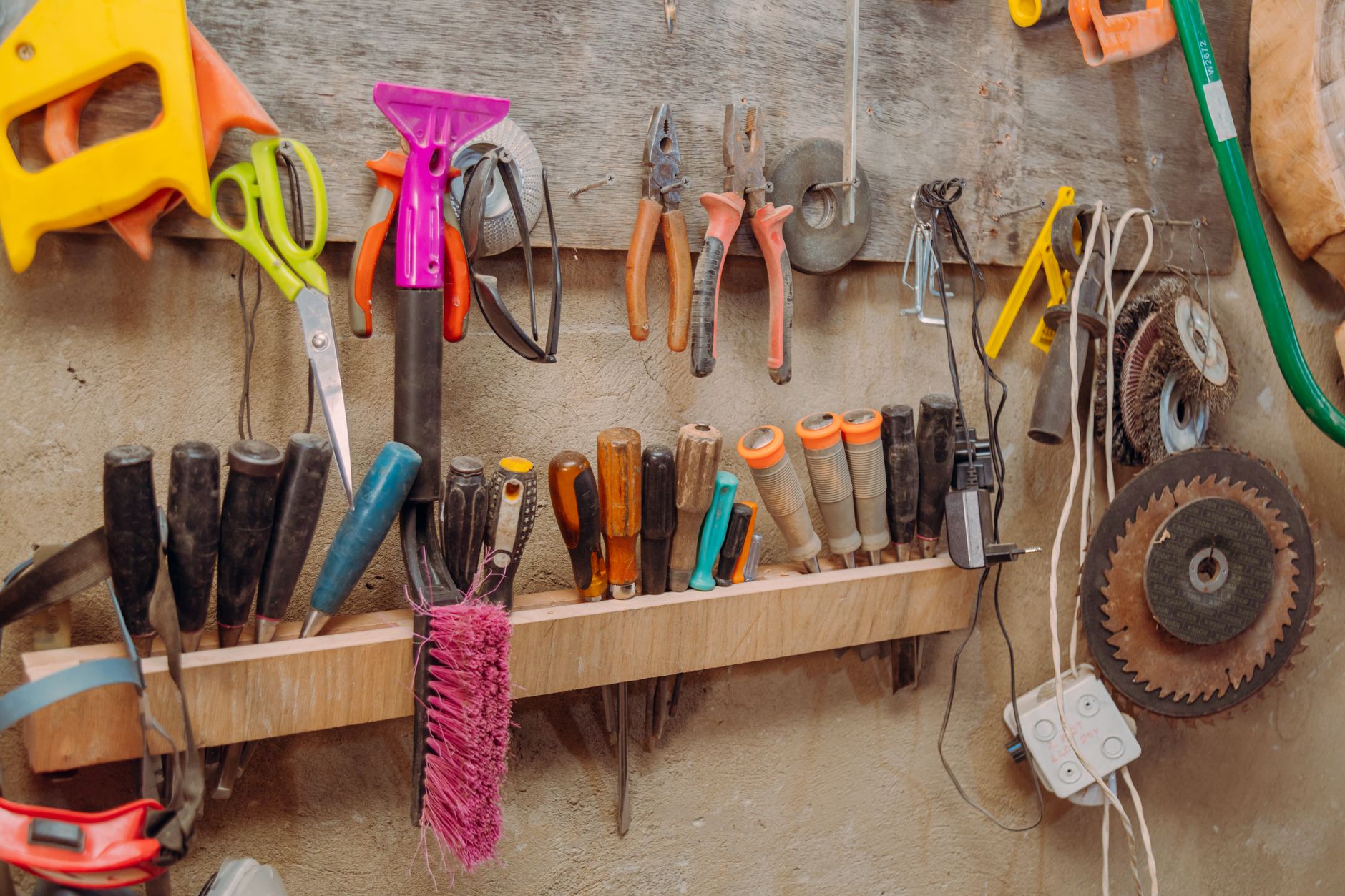 Screwdrivers and pliers ready for a home repair
