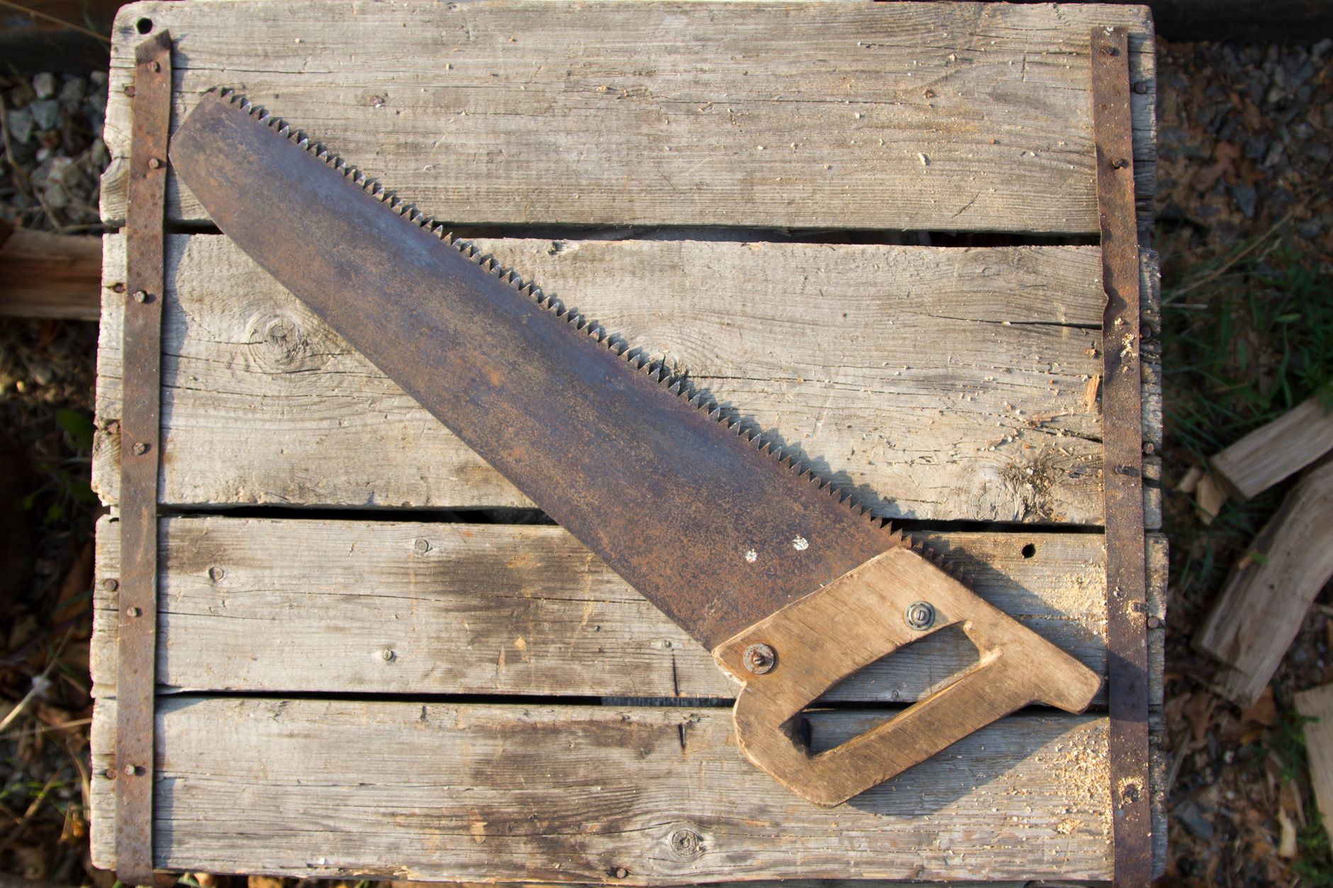A person working with wood and hand tools