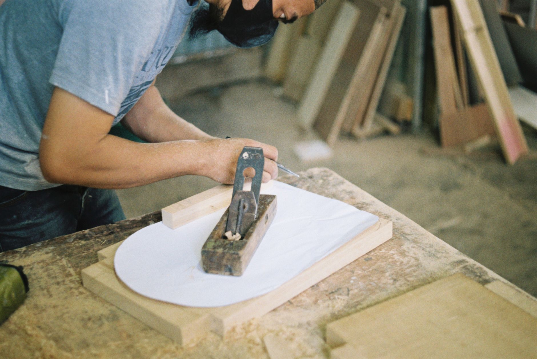 A carpenter working on a wood project