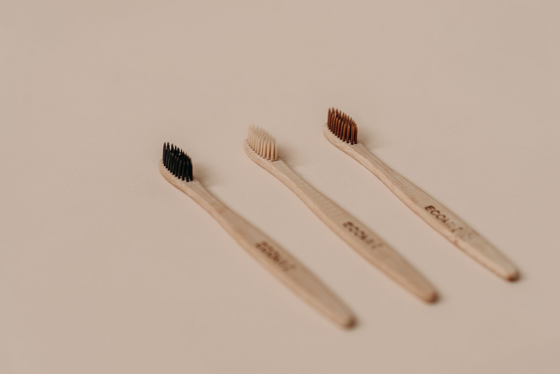 Three bamboo toothbrushes
