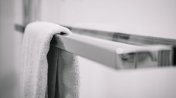 Best towel rack: towels hanging in a bright bathroom