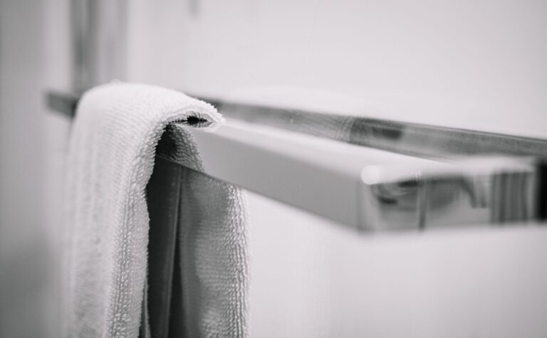 Best towel rack: towels hanging in a bright bathroom