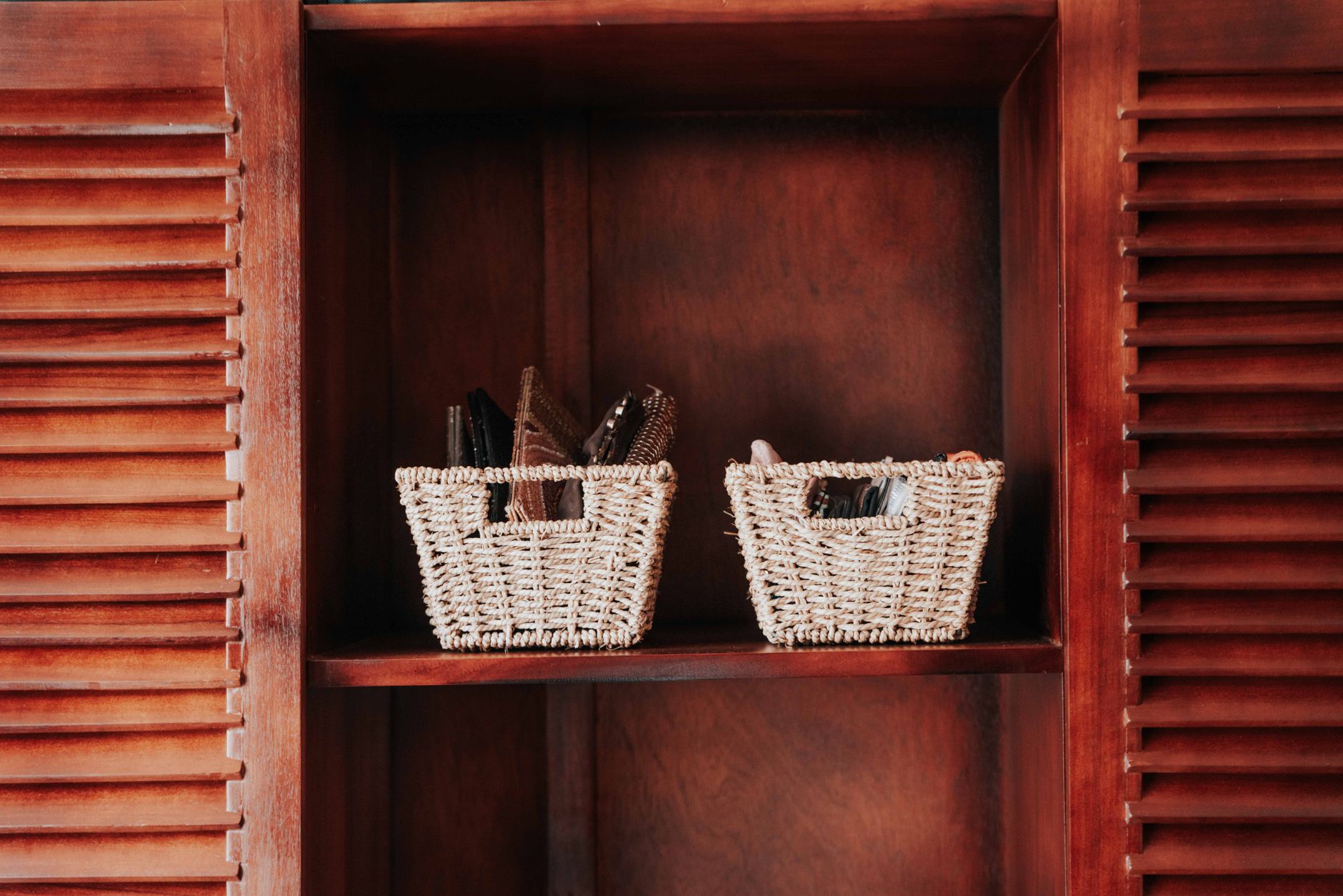 A fabric storage basket in a bedroom