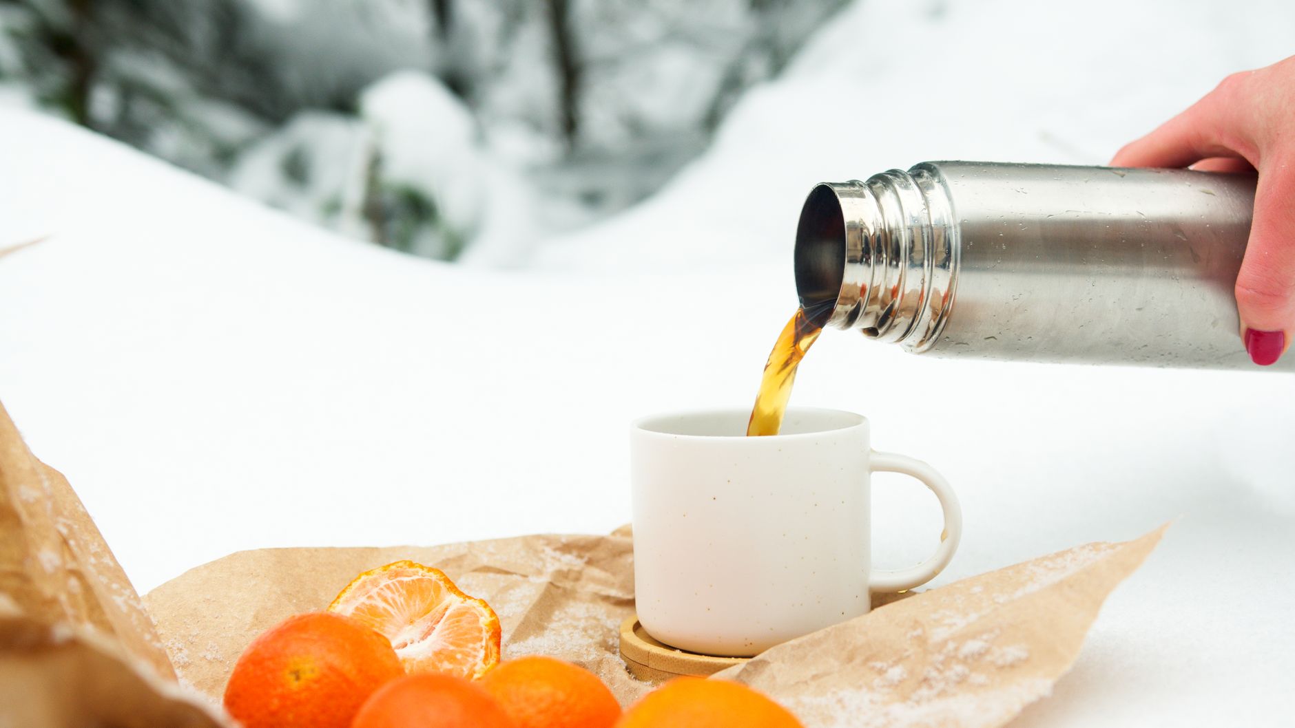 Coffee poured from a bottle outdoors