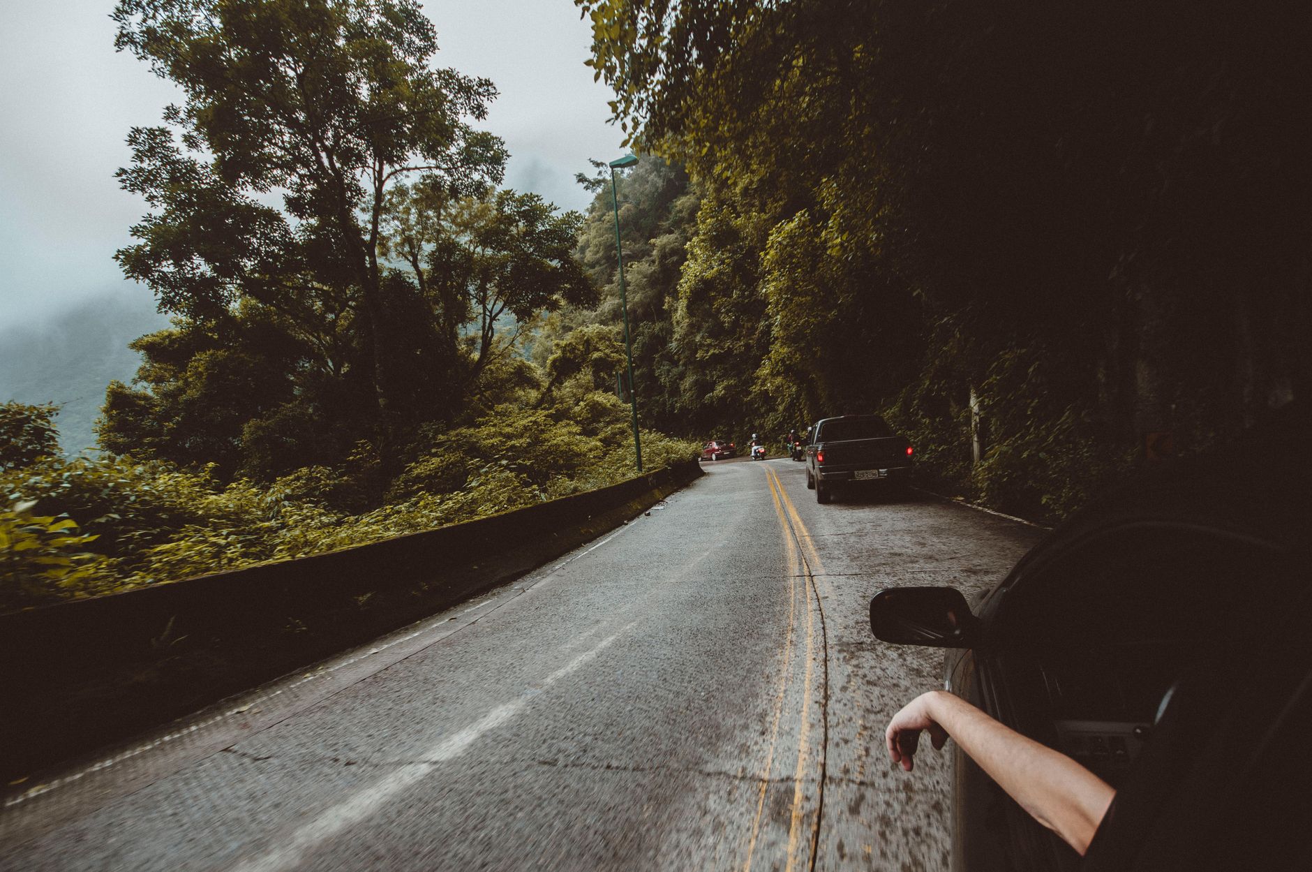 A car driving down an open road