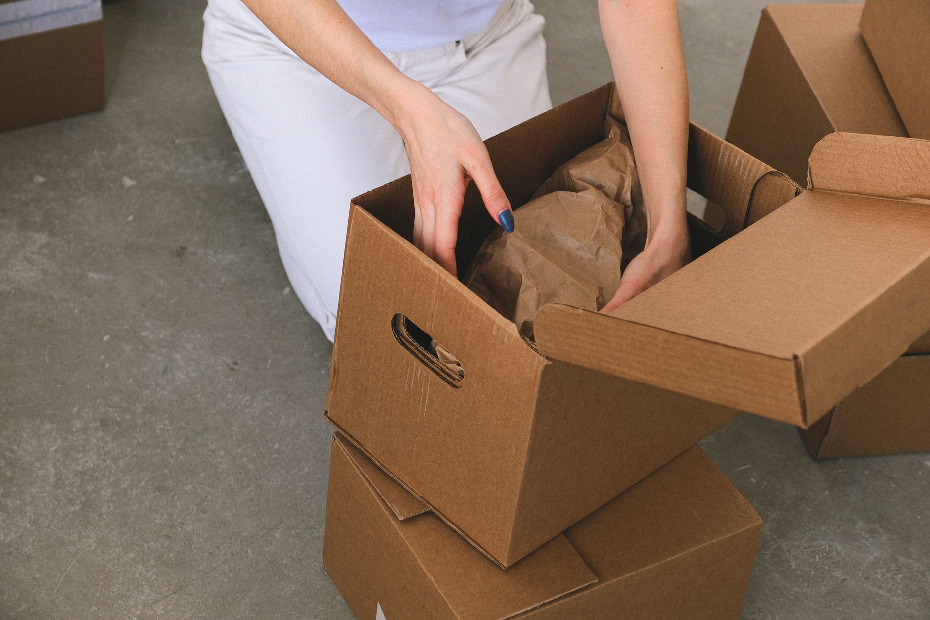 Packing items into a cardboard box