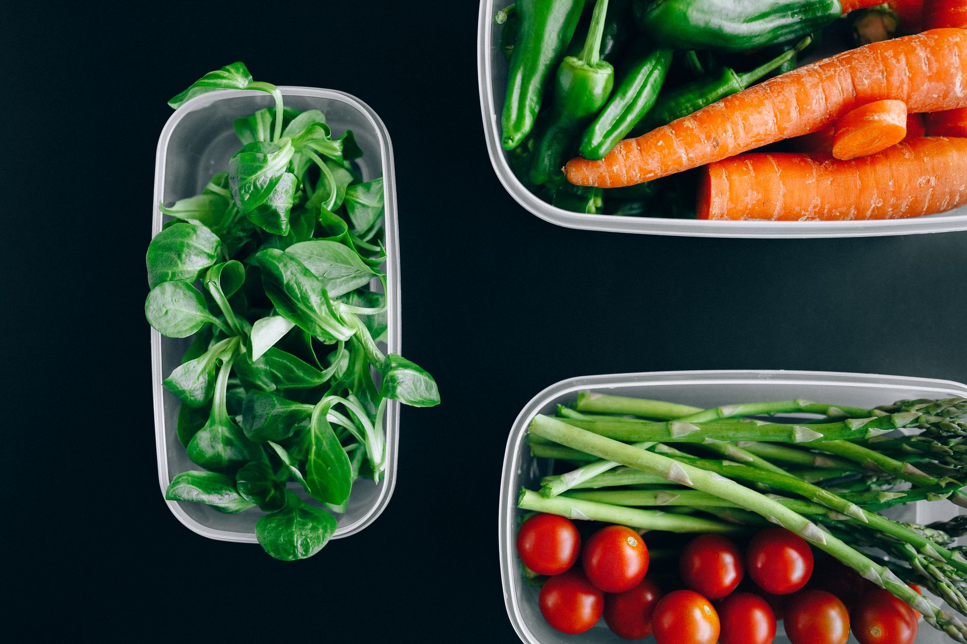 Vegetables portioned in plastic containers