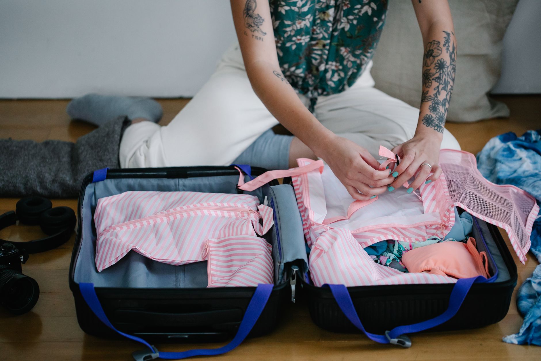 Packing clothes into a suitcase