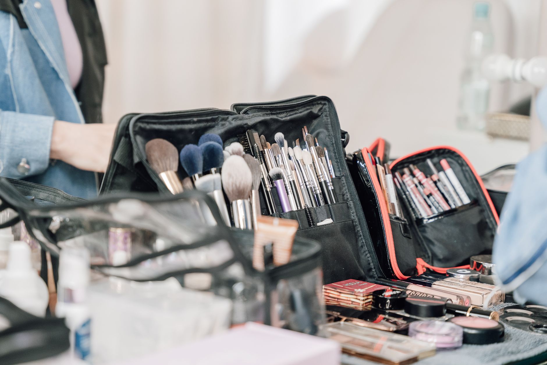 A small cosmetic bag packed for travel