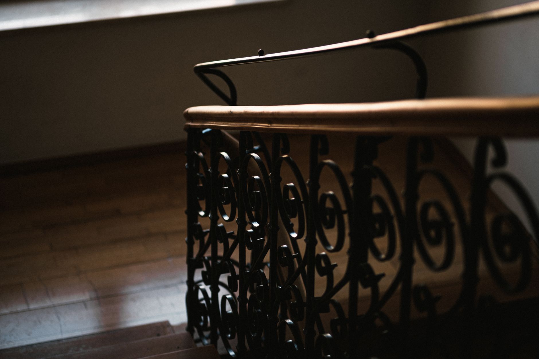 A staircase with a handrail inside a home