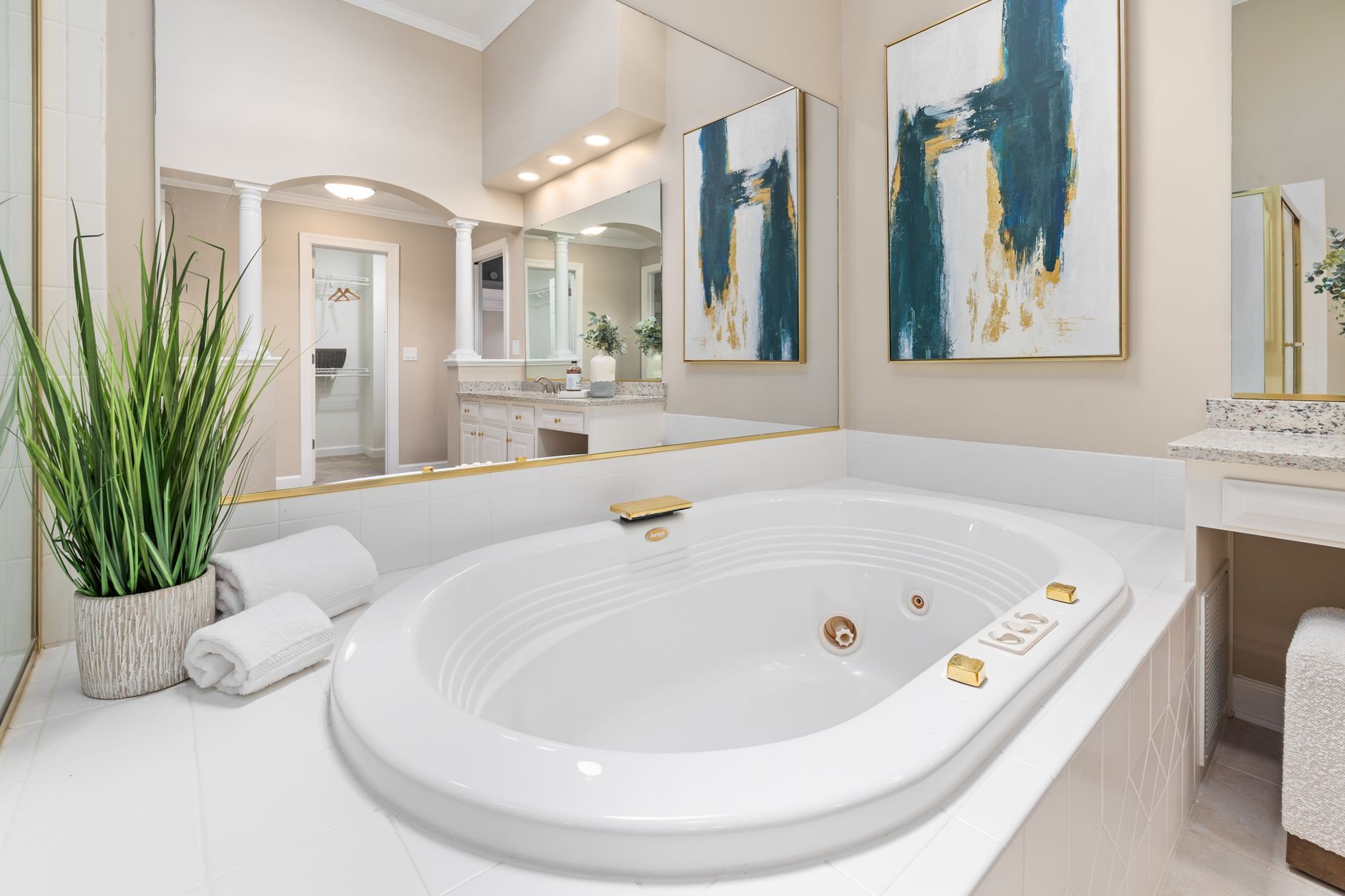 A bright bathroom with a bathtub