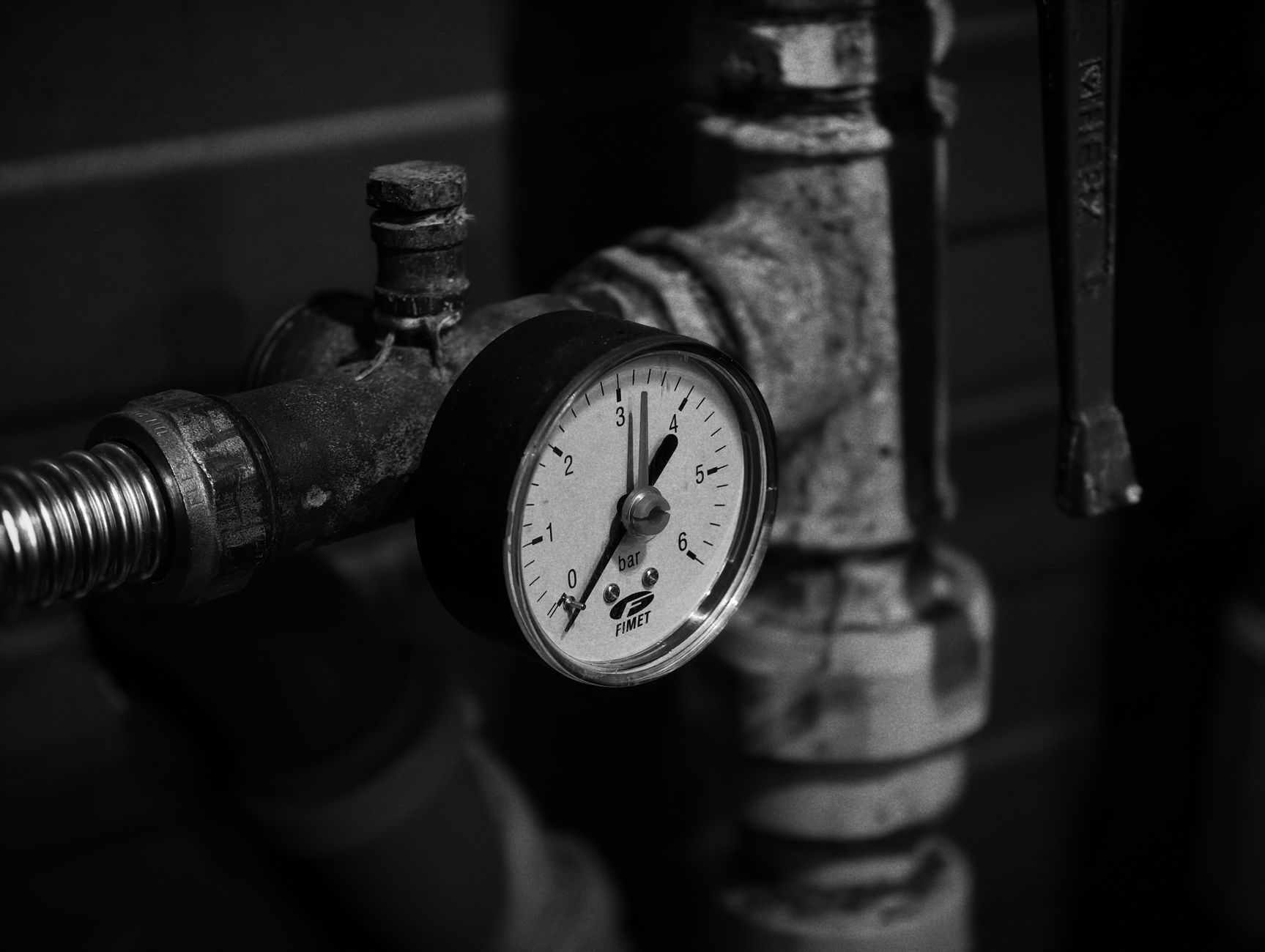 A pressure gauge on a water pipe