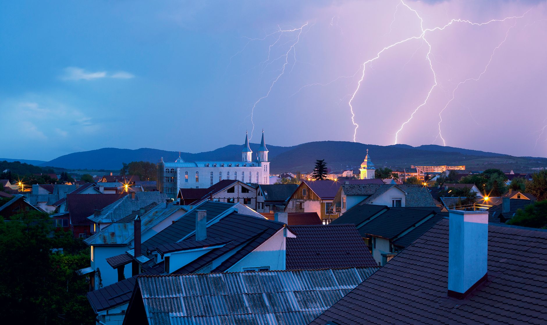 Best weather radio: lightning over a town