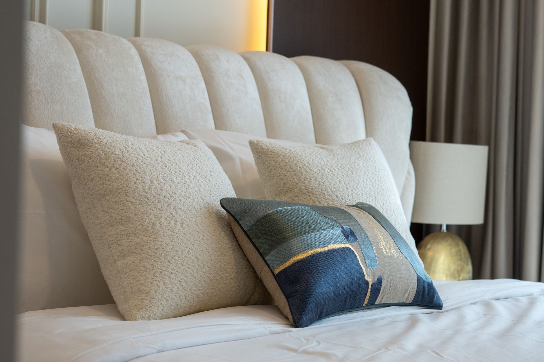 Pillows stacked against a headboard