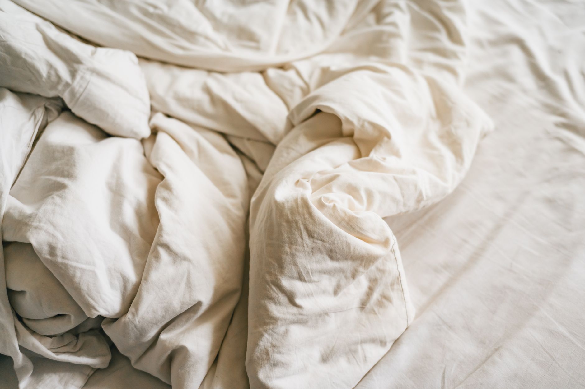 Rumpled cream bedding