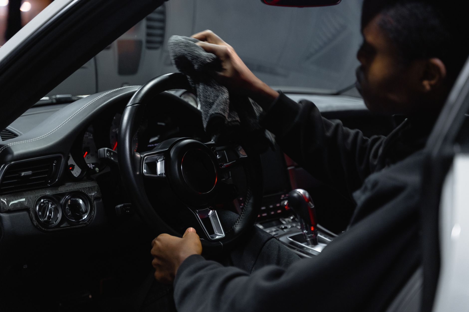 Wiping down the interior of a car