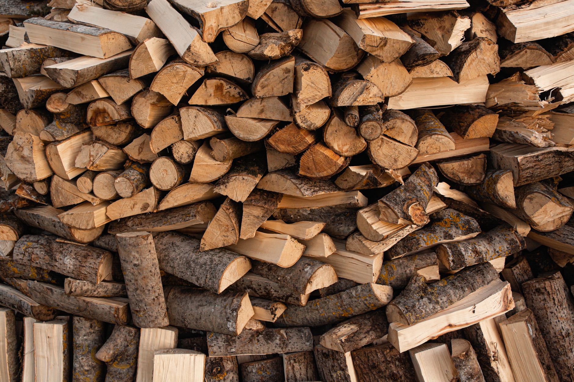 Split firewood stacked high